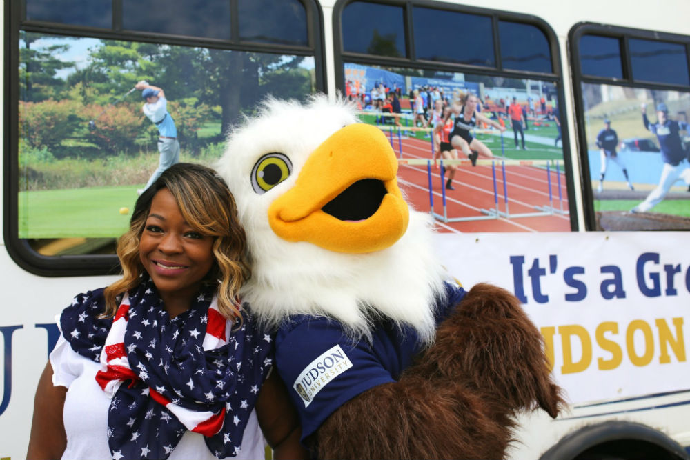 AJ Eagle posing with a fan