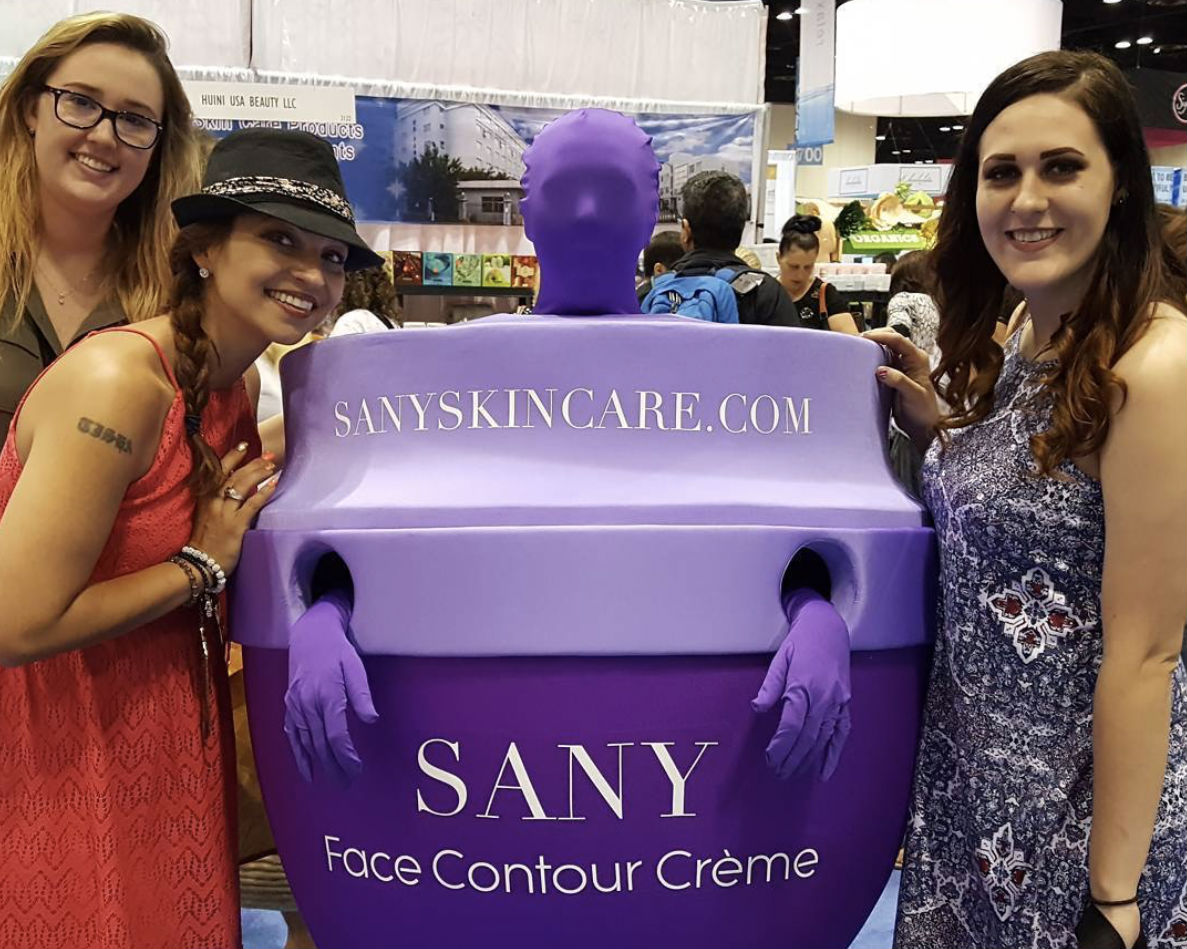 Sany Skin Care mascot at a trade show