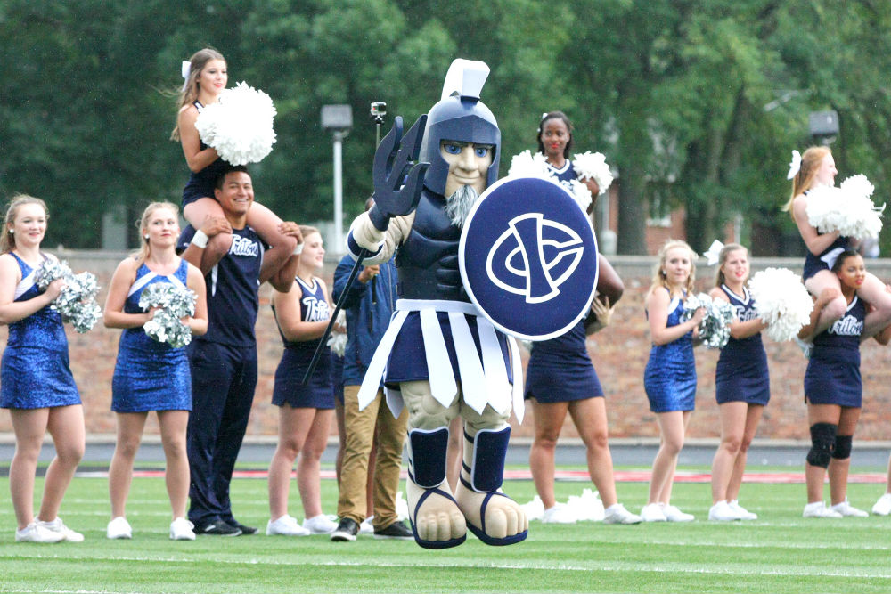 Mascot performing with cheerleaders