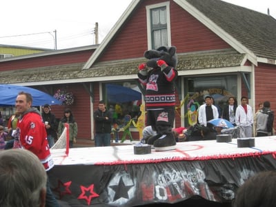 Hazelton Wolverine on hockey float in parade