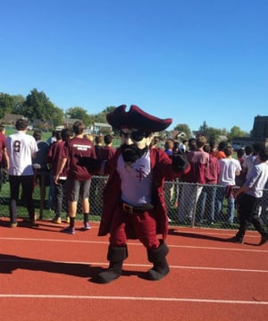 The Masked Marauder Mascot at the school's pep rally