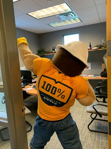 ESOP man mascot posing for a photo