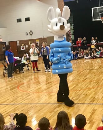 Oral Health Kansas Sippy mascot visiting a school