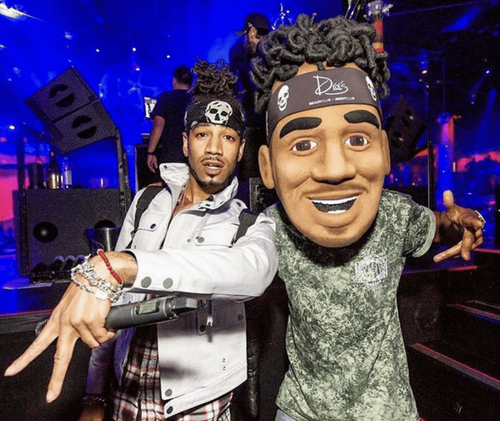 The DJ Esco mascot head in action